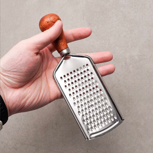 Multi-Function Stainless Steel Grater – All-in-One Shredder & Slicer for Cheese, Ginger, Vegetables & Zest – Versatile Kitchen Tool with Multiple Grating Sizes
